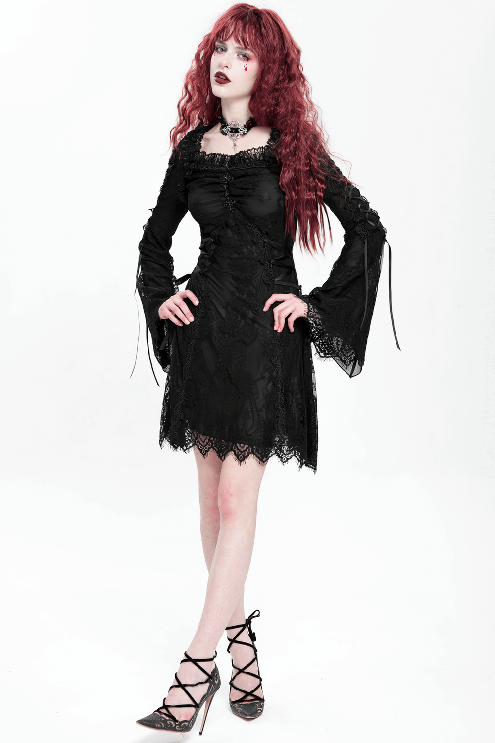 Elegant Gothic black lace mini dress with flared sleeves, showcasing dark romance and a sultry silhouette.