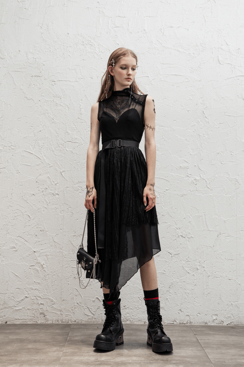 Elegant gothic black mesh sleeveless top with high neck and edgy punk rock accessories.