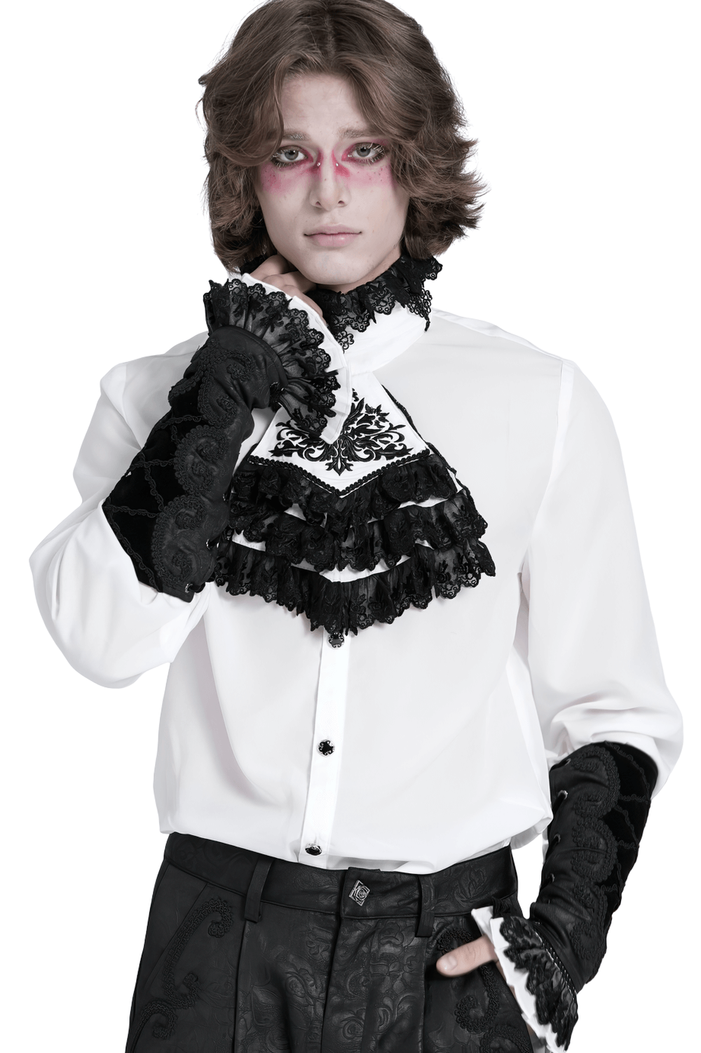 Gothic fashion model in a white shirt with black lace ruffles and sleeves, capturing elegant vintage style.