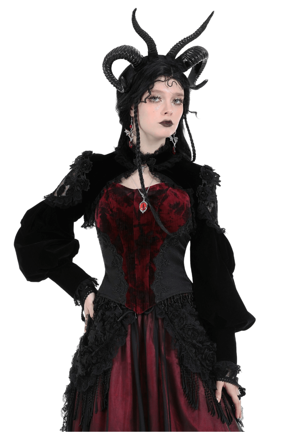Elegant woman in gothic black velvet bolero with horns, showcasing lace trim and a regal style for evening wear.