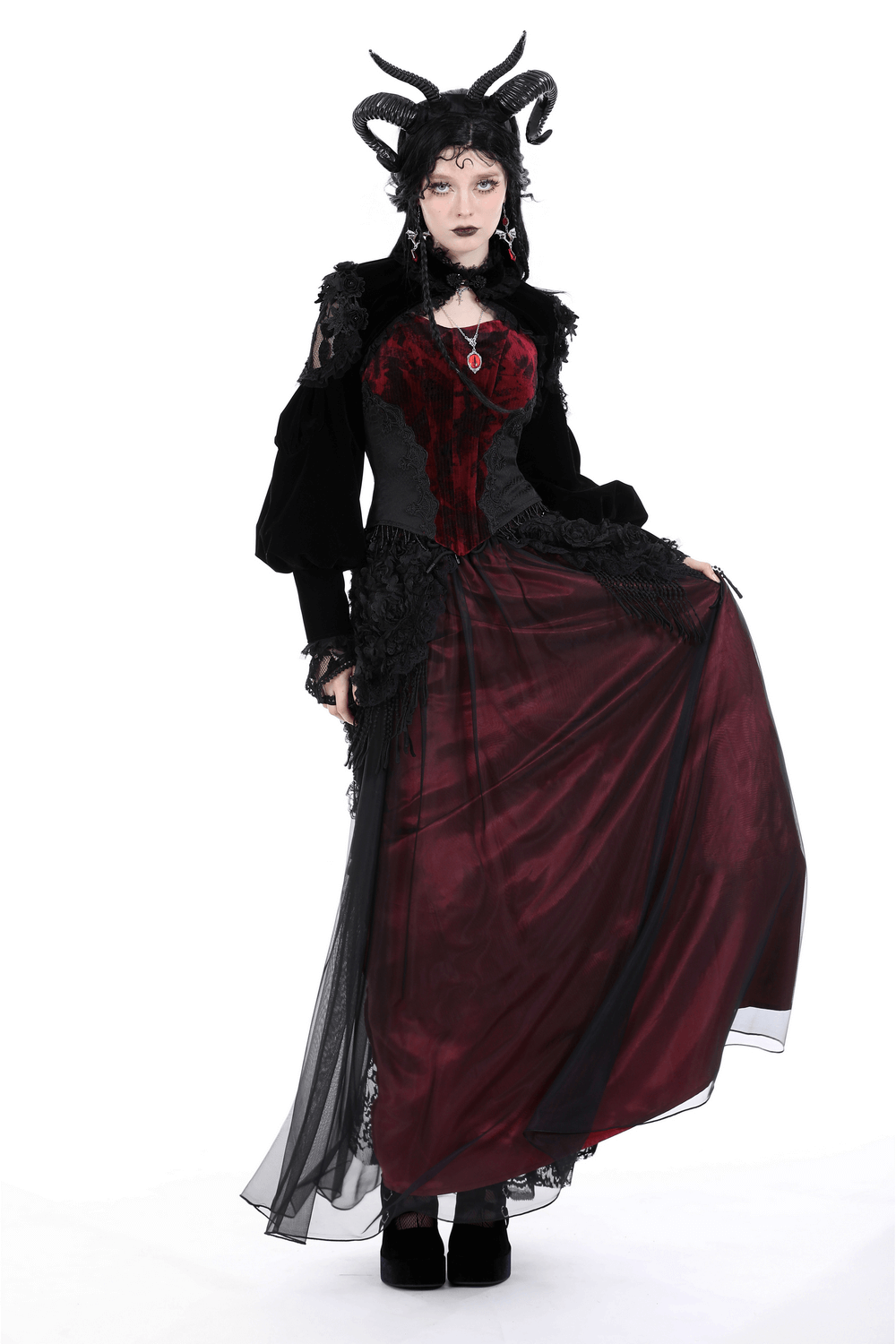 Elegant gothic woman in a dramatic burgundy dress with lace details and stylish black bolero, exuding timeless charm.