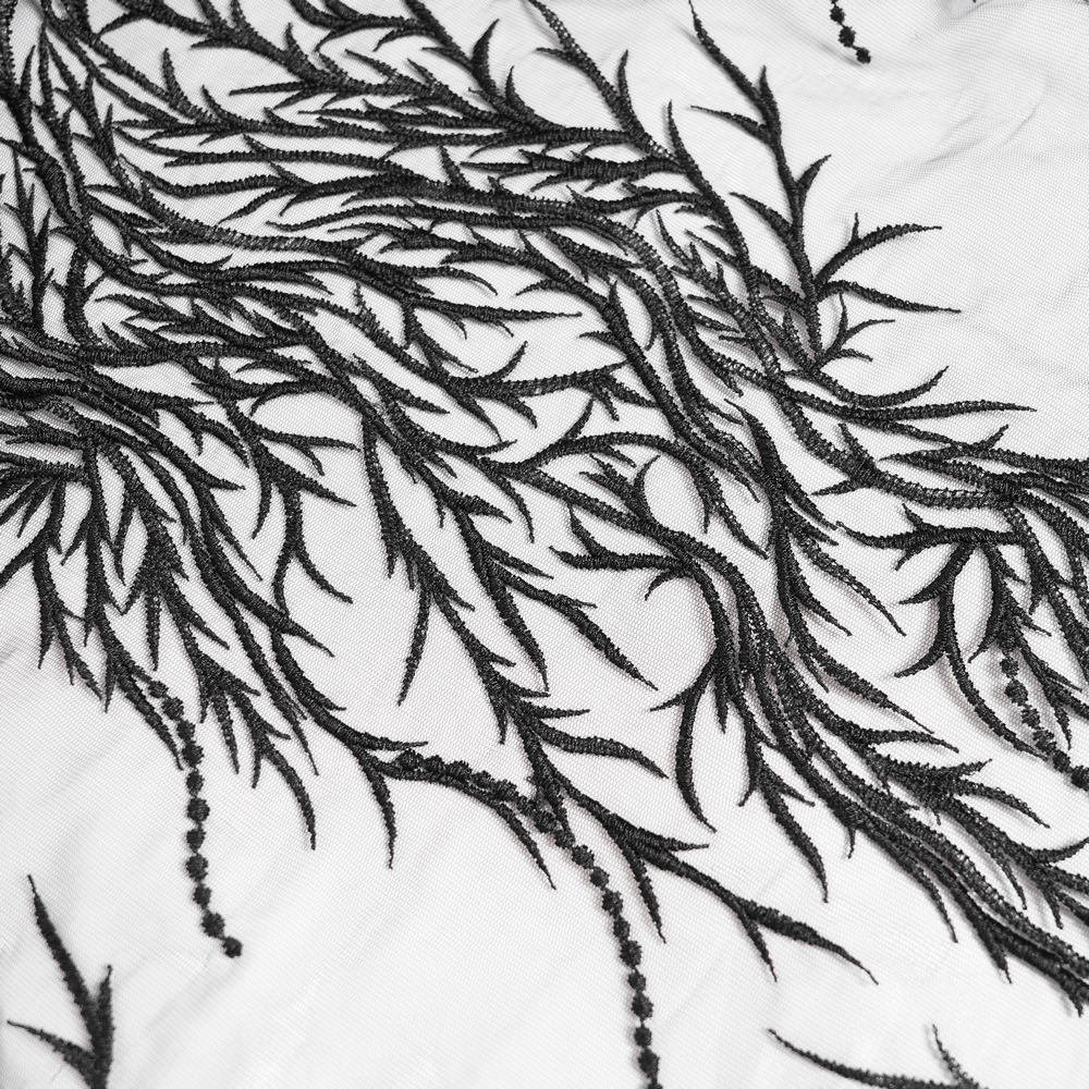 Black floral embroidery on white fabric, featuring intricate leaves and beaded details, perfect for gothic fashion.