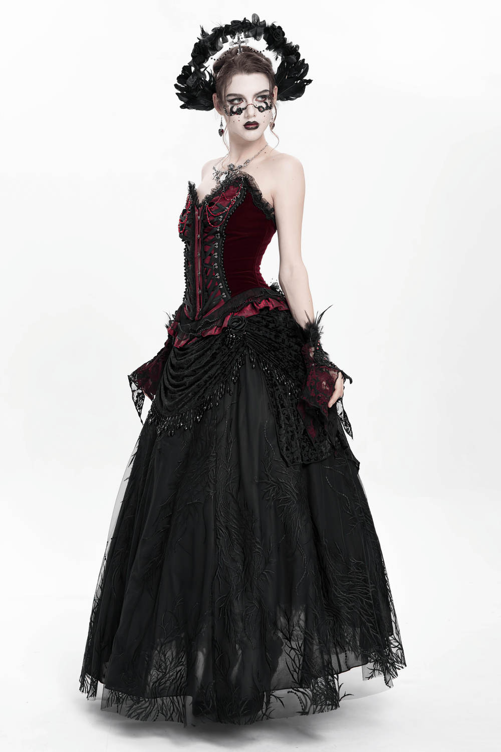 Elegant gothic Victorian corset dress with black layered skirt and lace accents, perfect for dark romantic styles.