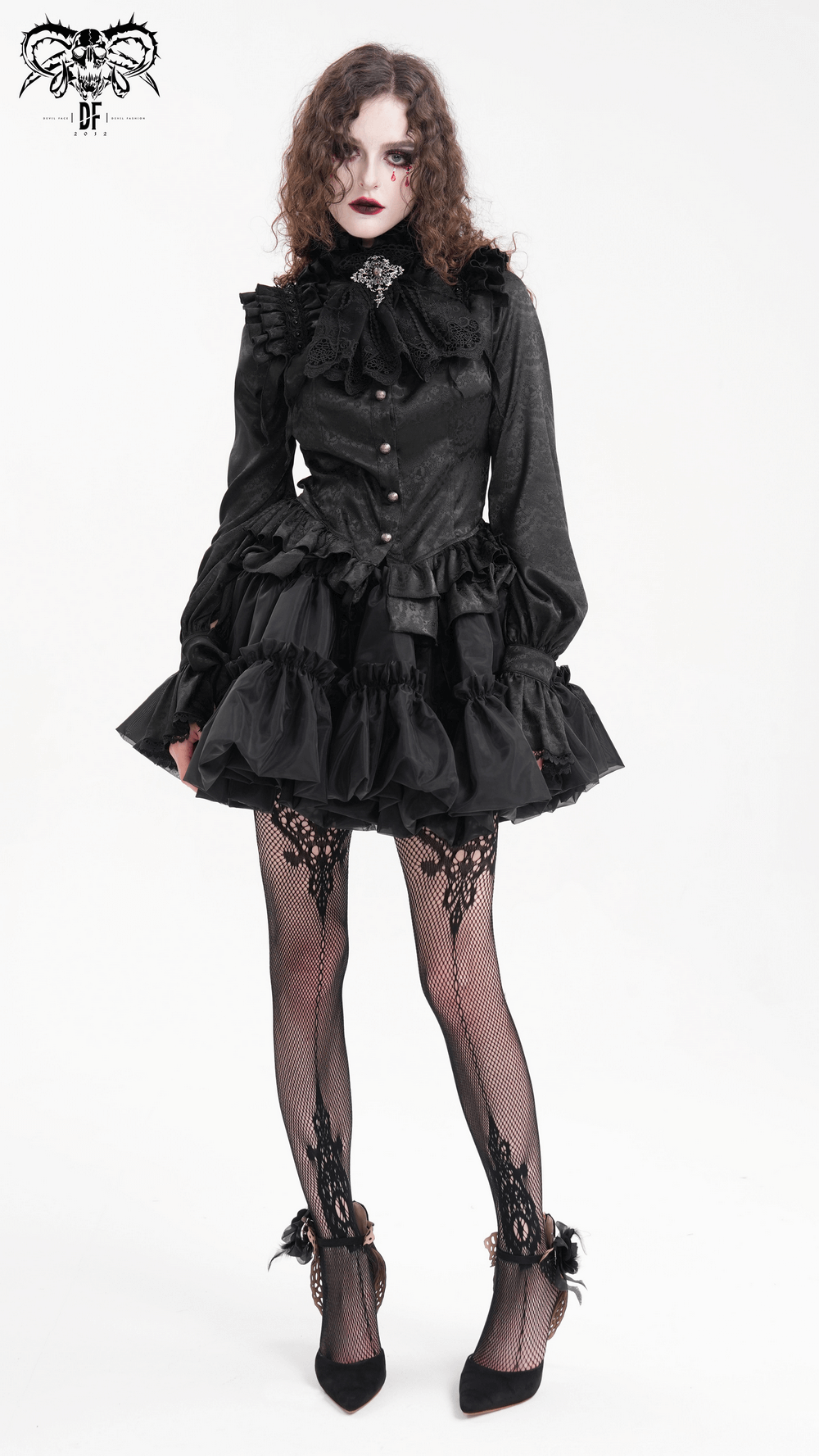 Victorian-inspired black gothic blouse with lace ruffles and puff sleeves, styled for dark elegance.