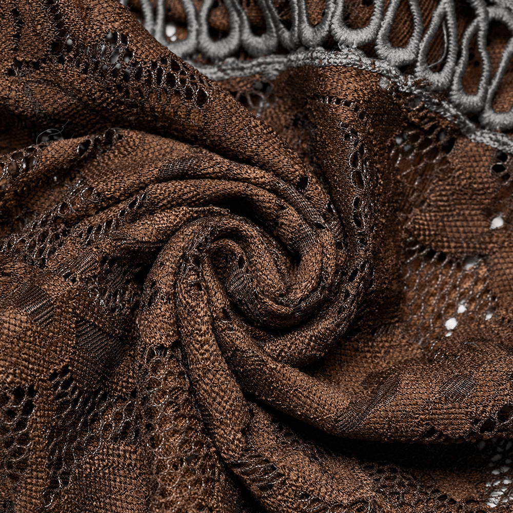 Close-up of elegant brown lace fabric with intricate patterns, perfect for gothic-style flared trousers.