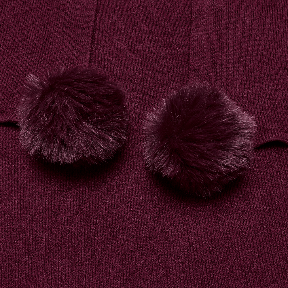 Close-up of elegant burgundy shawl featuring soft faux fur pom pom details, perfect for gothic fashion lovers.