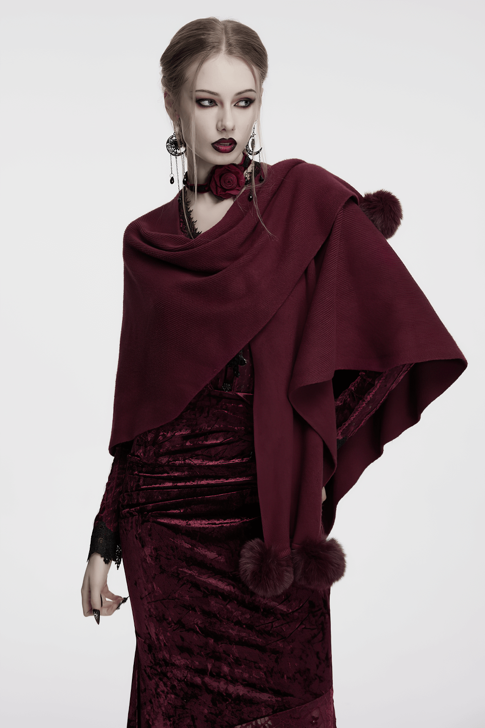 Elegant gothic burgundy shawl with moon phase print, styled with luxurious accessories and dramatic flair.