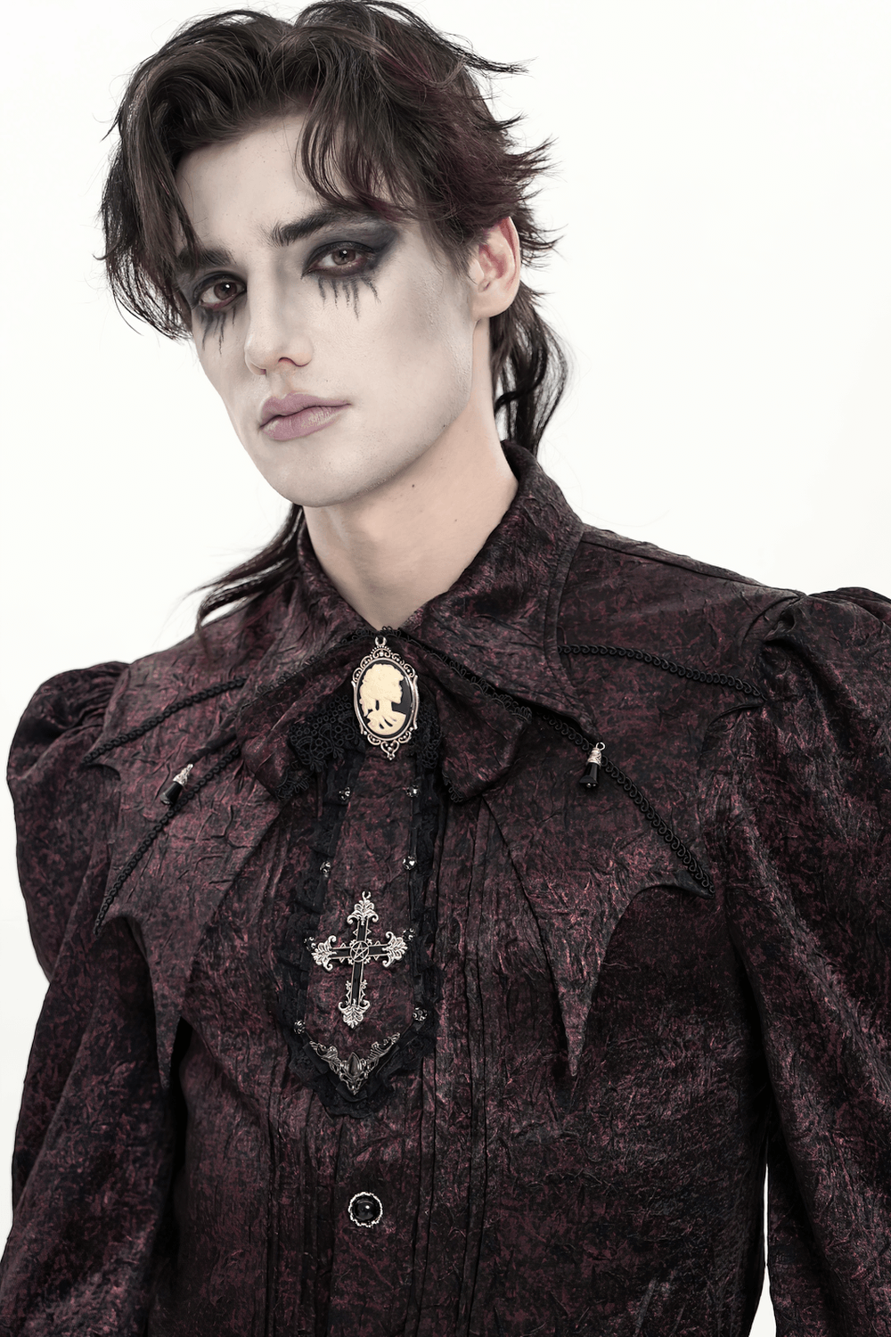 Elegant Gothic Cameo Cross Lace Cravat Neckwear showcased on a model with gothic makeup and textured dark clothing.