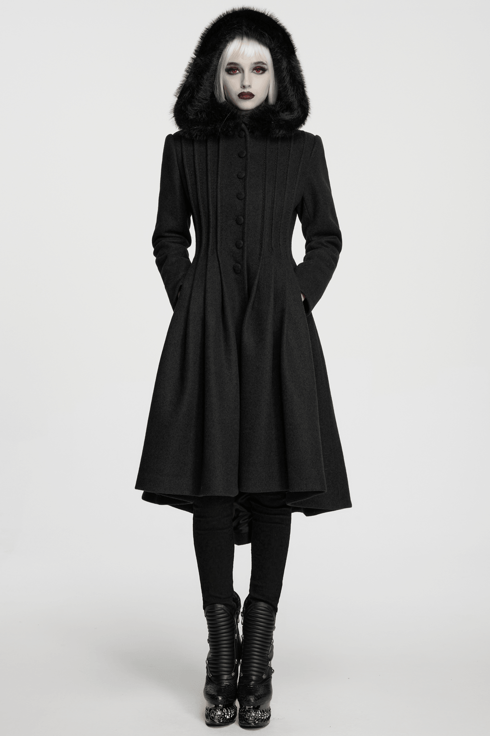 Elegant Gothic Coat with Fur Hood and Lace-Up Back worn by a model, featuring a chic black design.