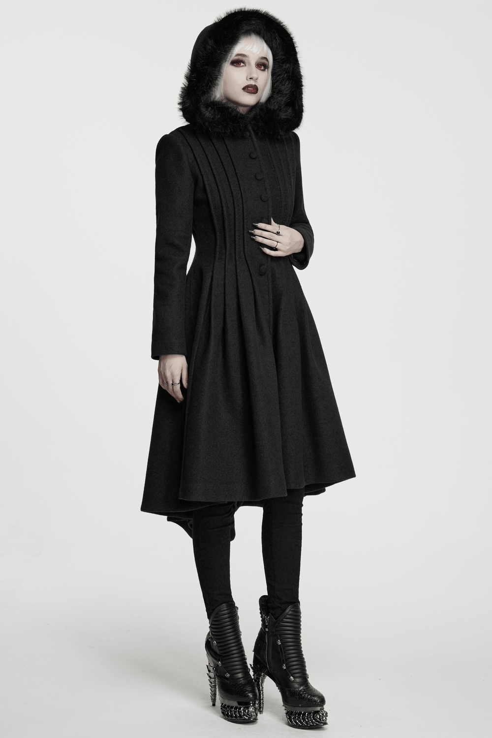 Elegant Gothic Coat with Fur Hood and Lace-Up Back showcased on a model in a stylish pose.
