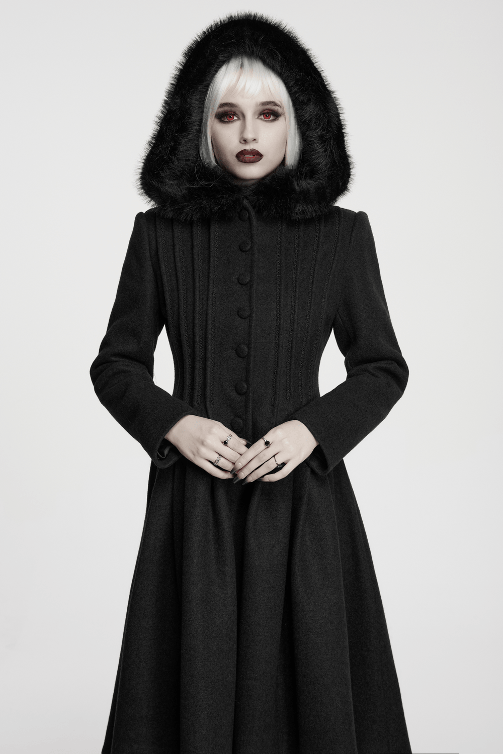 Elegant Gothic Coat with Fur Hood and Lace-Up Back worn by model showcasing its elegant style and design.