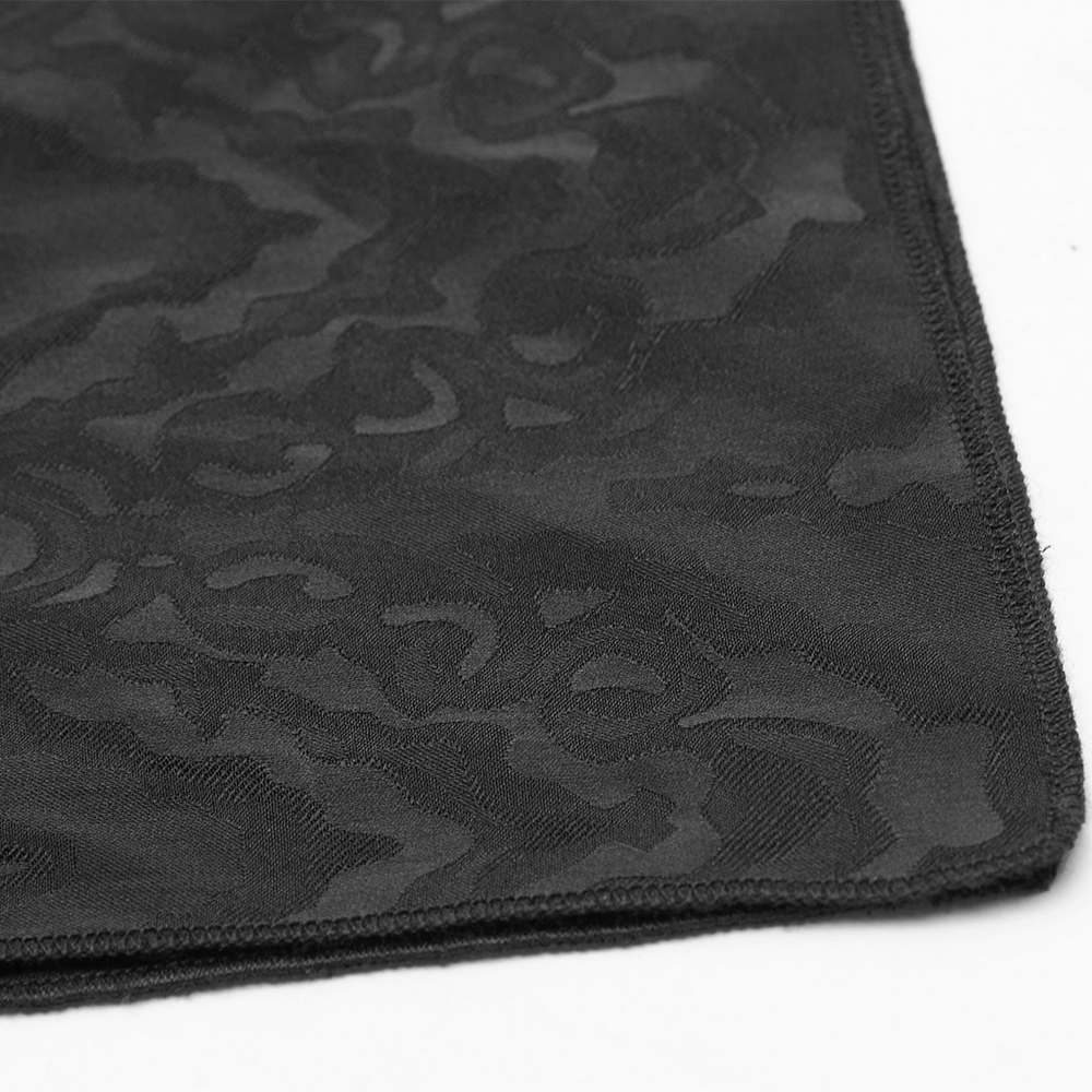 Elegant black Gothic jacquard triangular scarf fabric showcasing intricate patterns and stylish design.