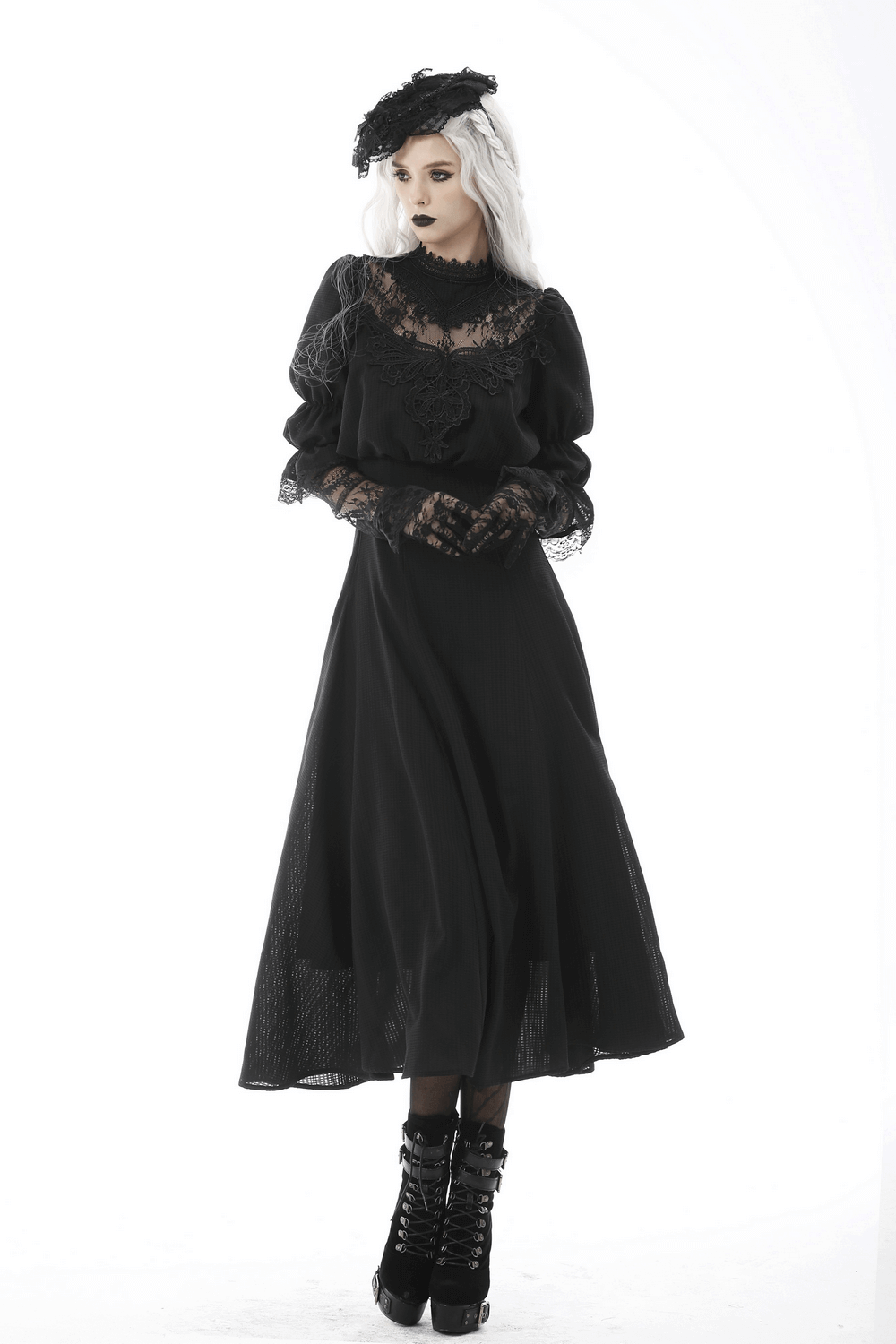 Elegant Gothic lace bustier dress with flowing maxi skirt and sheer sleeves, perfect for a hauntingly beautiful look.