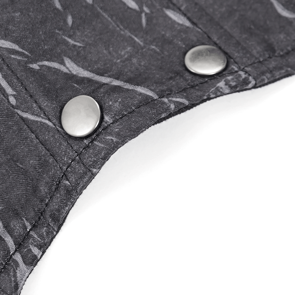 Close-up of elegant gothic corset fabric with metal buttons and intricate brocade pattern.