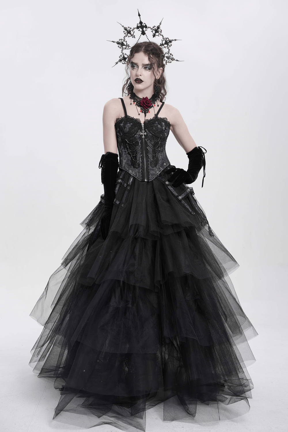 Elegant Gothic corset gown with layered tulle, lace details, and a crown accessory.