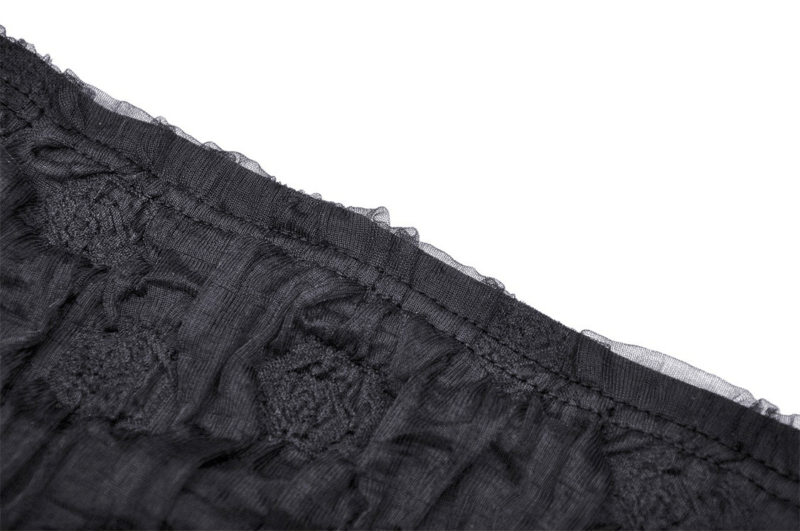 Close-up of black lace crinkle camisole showcasing intricate rose lace trim and delicate texture.
