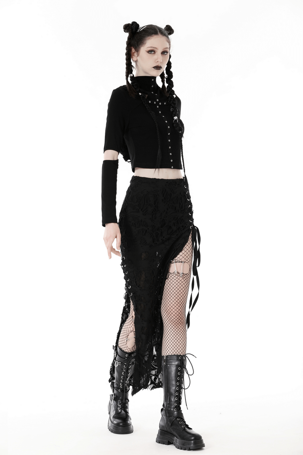 Model wearing an Elegant Gothic Lace Detailed Side-Laced Long Skirt with combat boots and a cropped top in black.