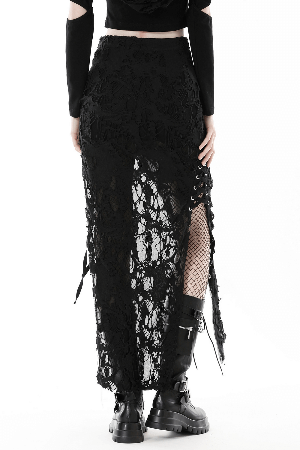 Back view of elegant gothic lace black skirt with side lacing and slit, paired with combat boots for an edgy look.