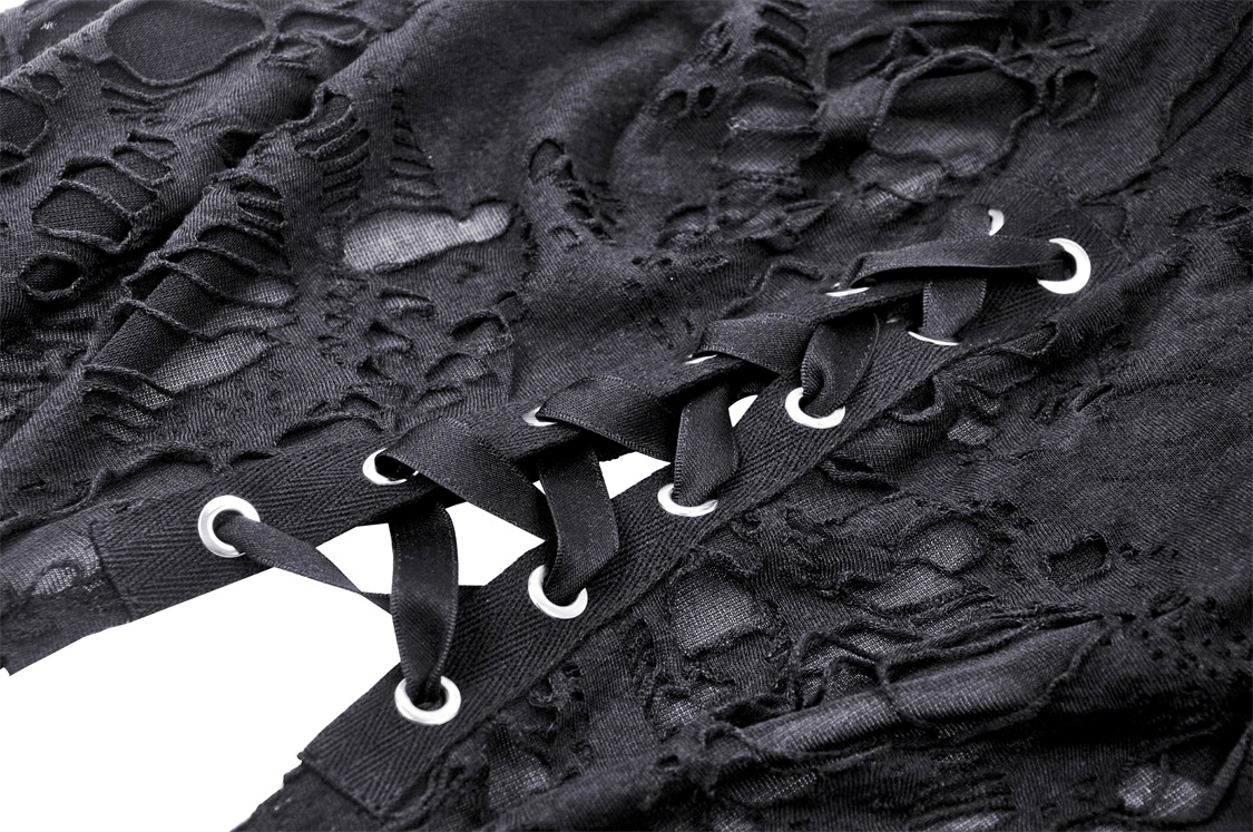 Close-up of black gothic skirt with intricate lace detailing and side lacing for an edgy look.