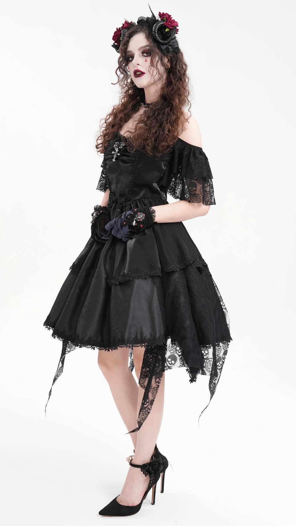 Elegant gothic lace dress featuring skull details, halter design, and tiered layers for a hauntingly beautiful look.