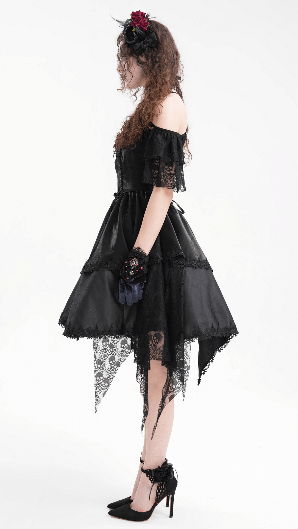 Elegant gothic lace dress with skull details, halter design, and asymmetrical hemline for a striking look.