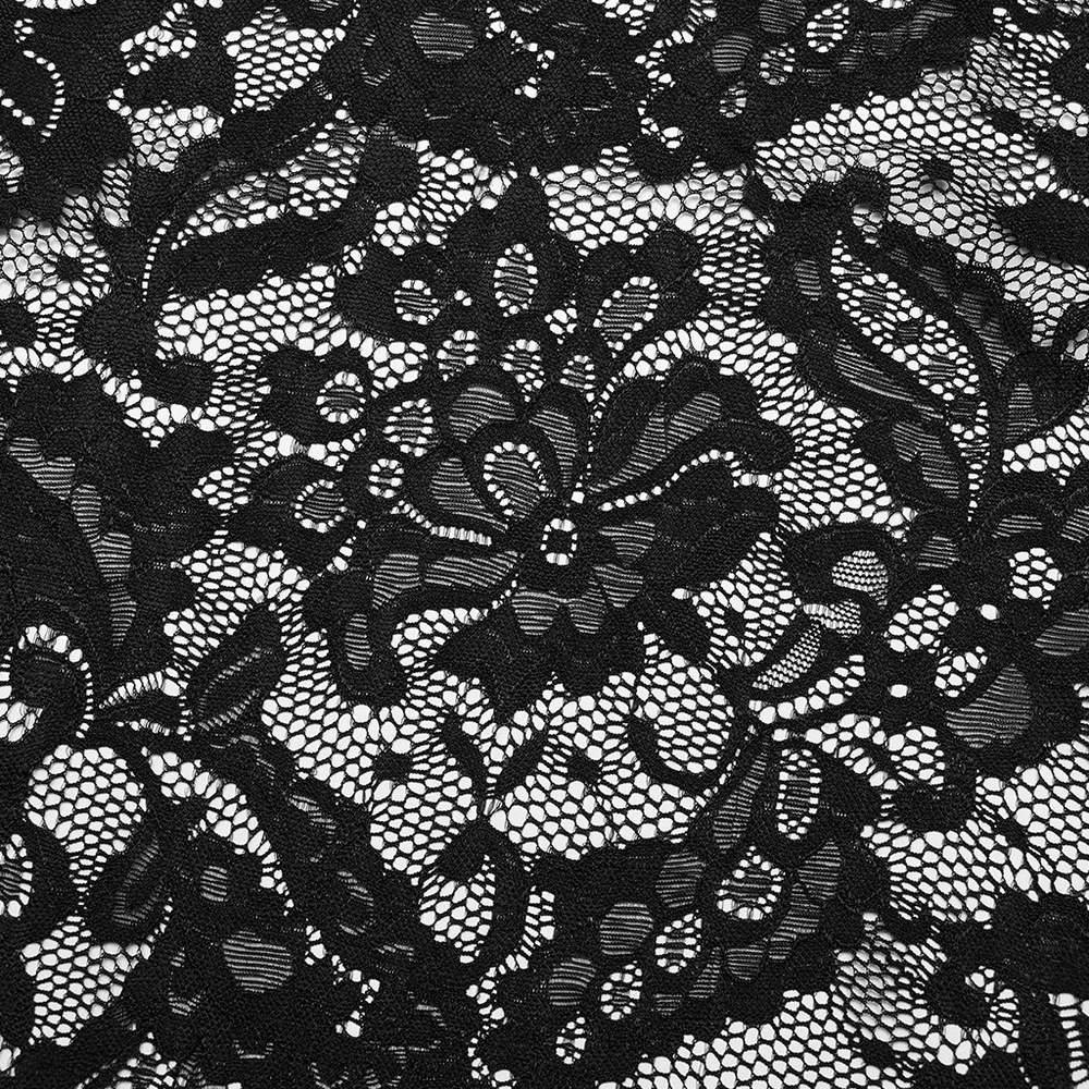 Close-up of elegant black lace fabric featuring intricate floral patterns, perfect for gothic fashion designs.