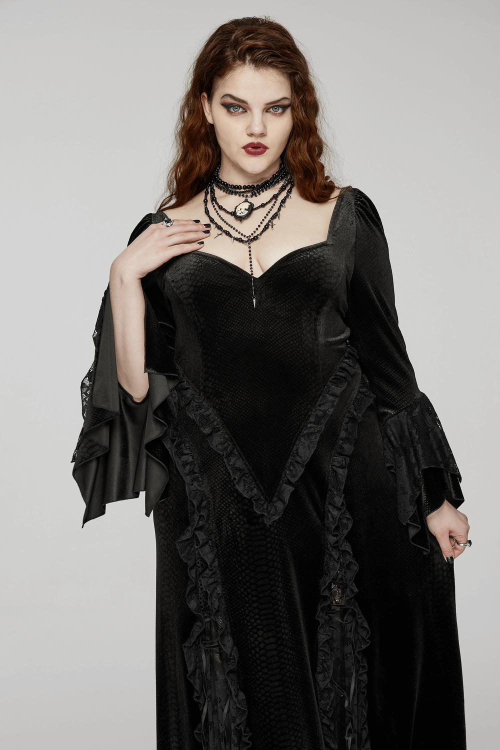 Elegant Gothic Lace Maxi Dress with bat neckline and flared sleeves, perfect for a chic Gothic wardrobe.