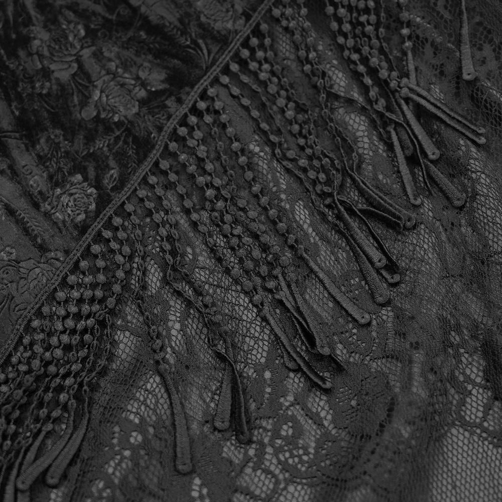 Elegant black lace fabric with intricate floral embroidery and dramatic tassels, perfect for gothic fashion.