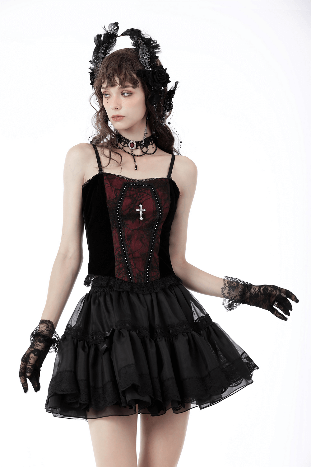 Elegant gothic lace corset top in black and wine red worn with a black ruffled skirt, showcasing dark aesthetic fashion.
