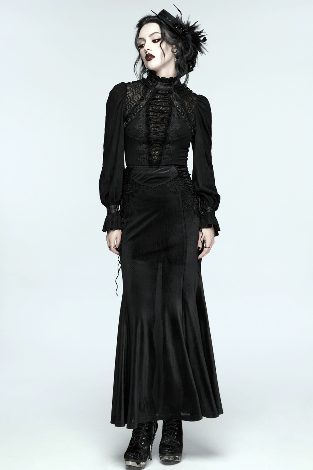 Alt Tag: Elegant Gothic Lace-Up Vampire Blouse With Flared Cuffs worn with long black skirt, lace-up front and dramatic cuffs