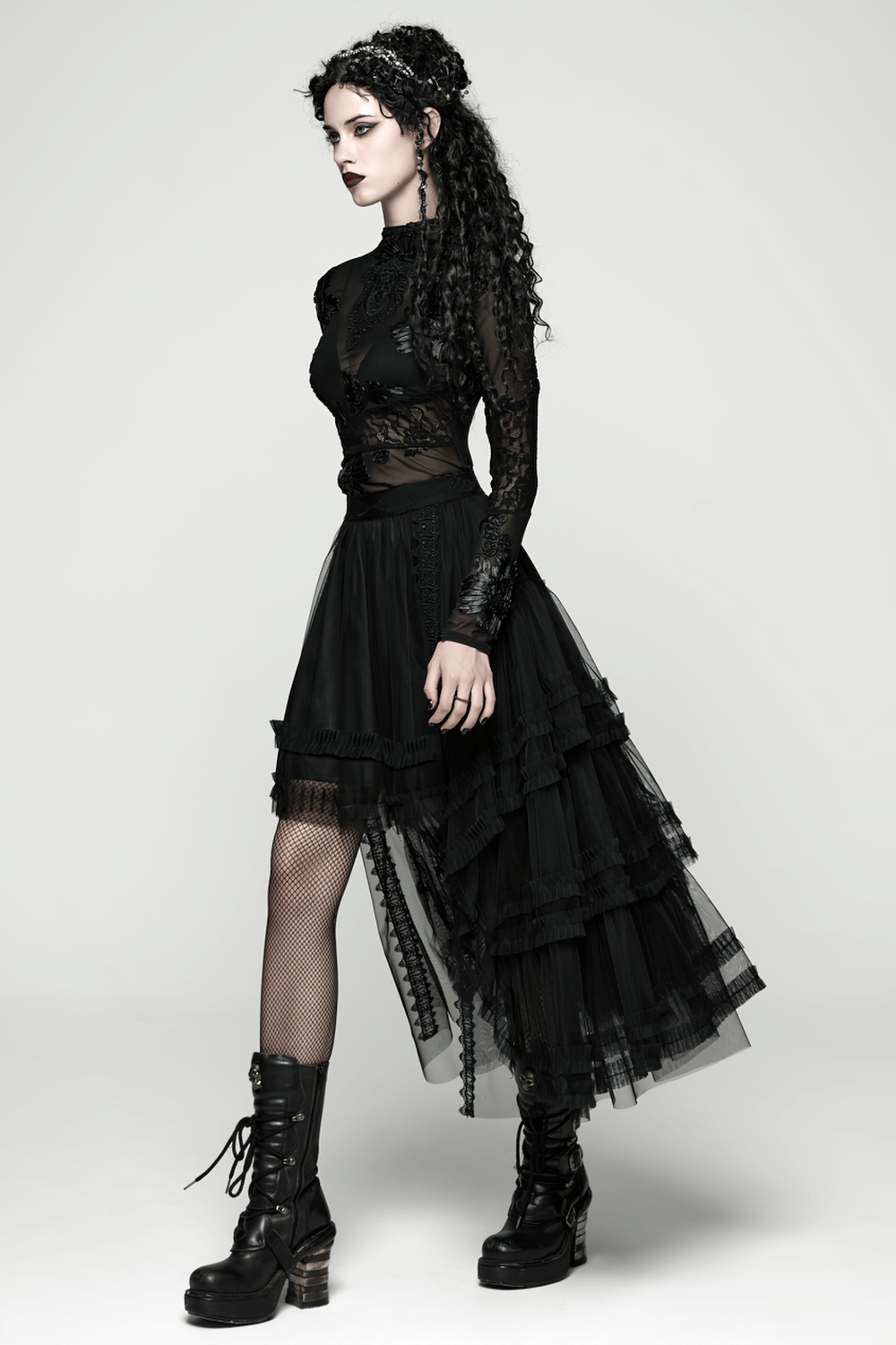 Elegant Gothic Layered Black Mesh and Jacquard Skirt styled with a black lace top and combat boots.