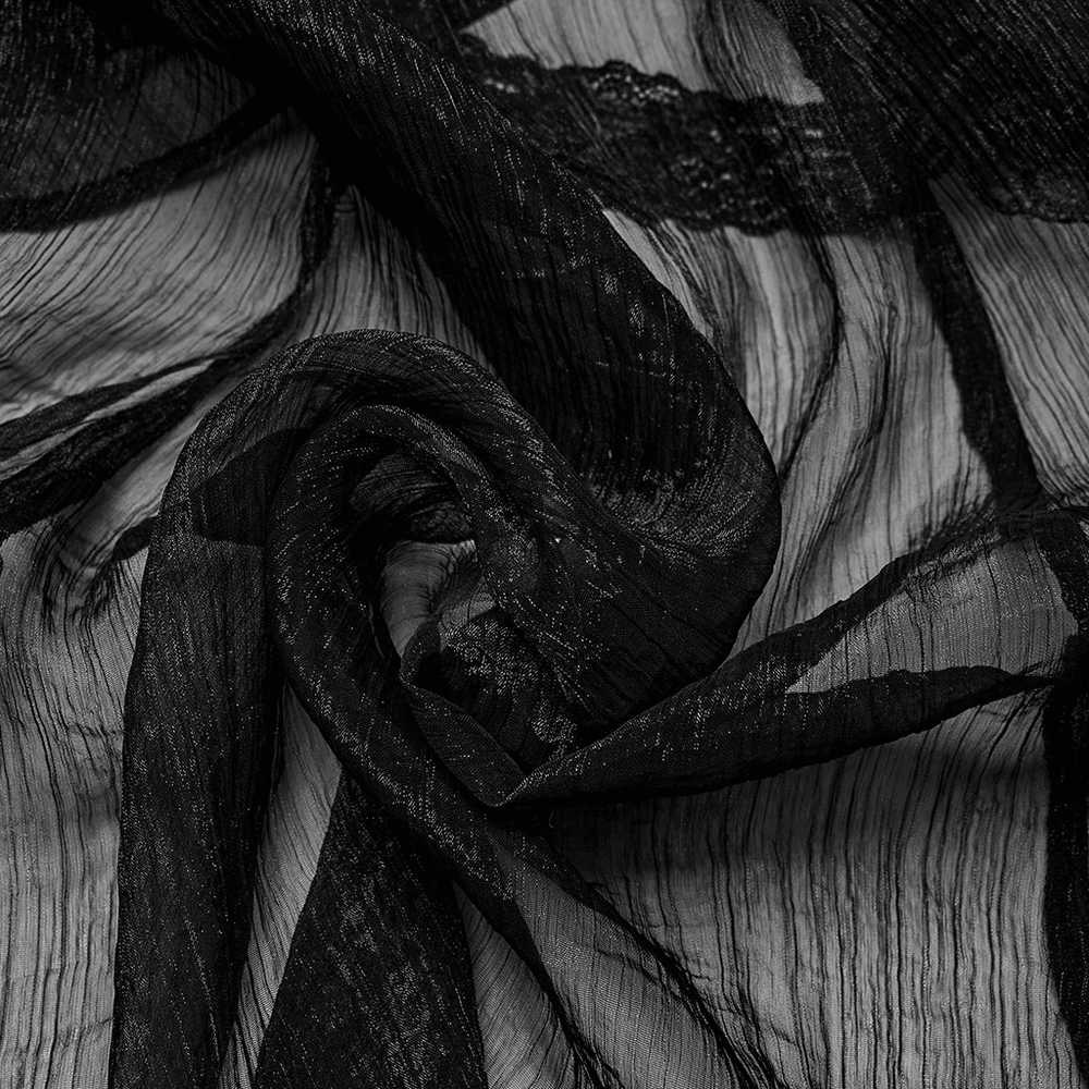 Close-up of elegant black chiffon fabric with a textured design, perfect for a gothic long cape.