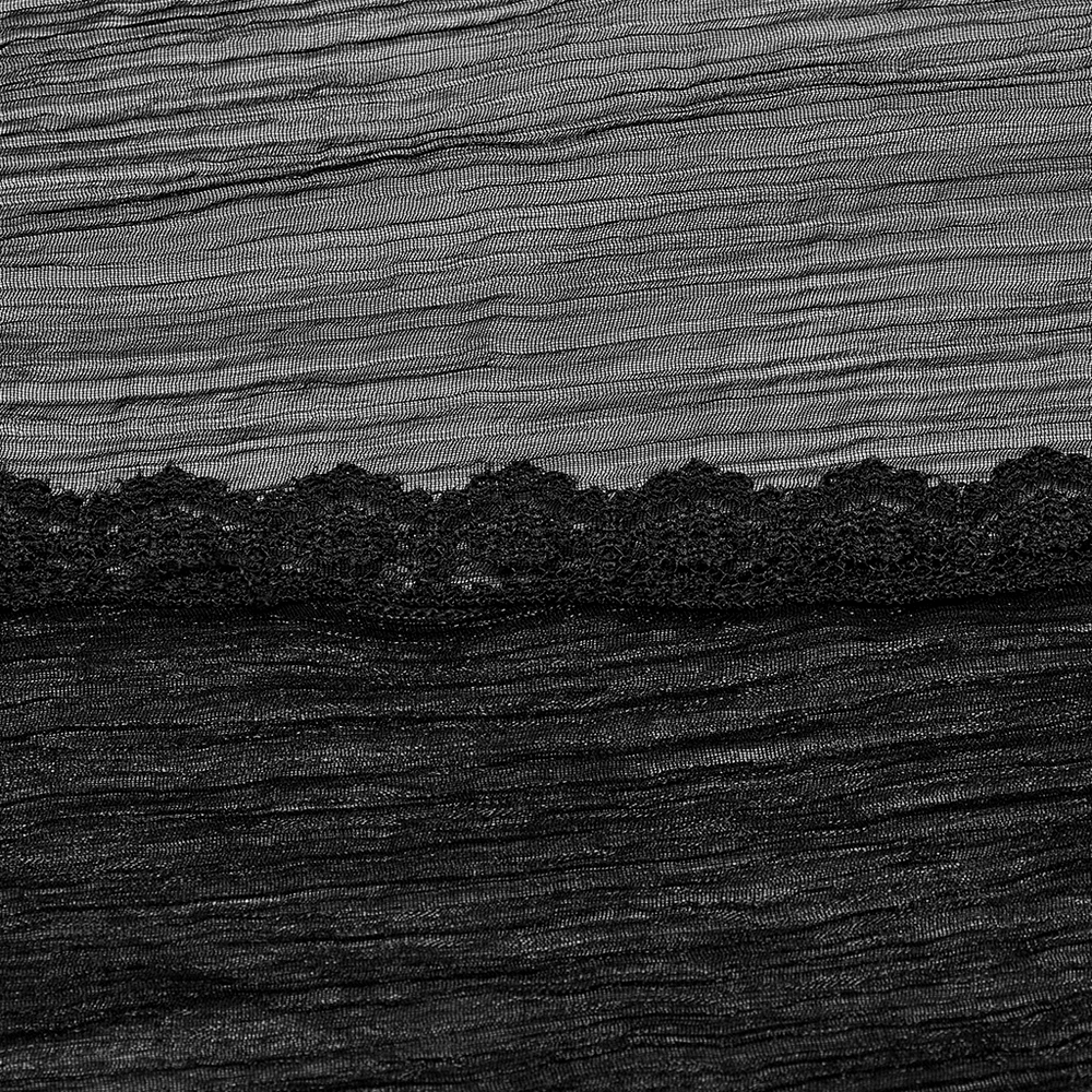 Close-up of black chiffon fabric with delicate lace trim, showcasing elegant and gothic textures.