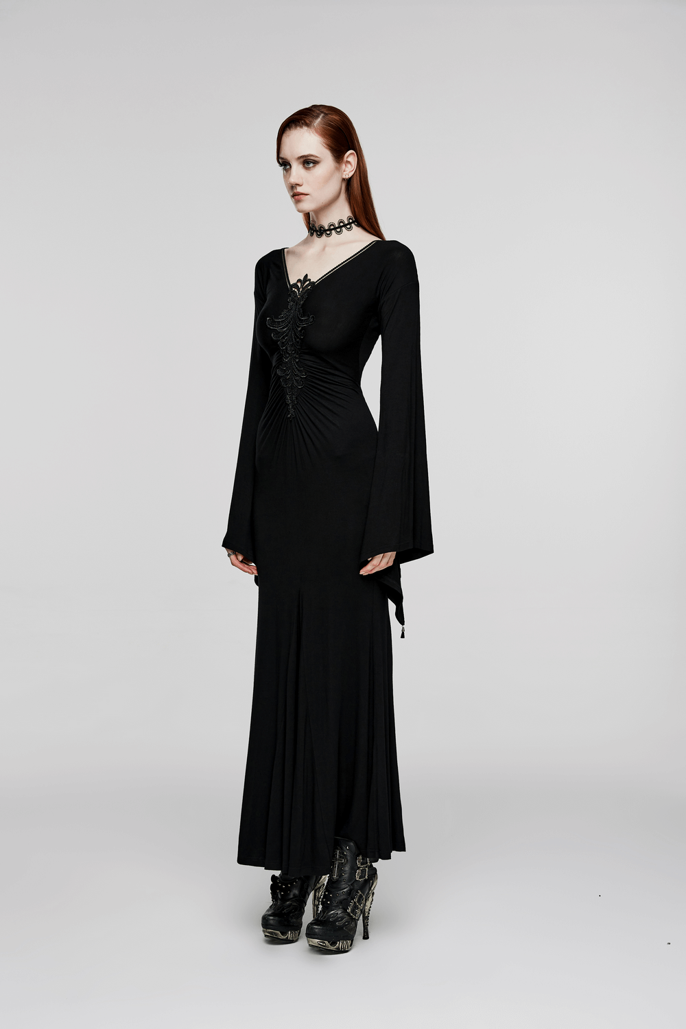 Elegant gothic long flared sleeve dress with lace detailing, featuring a stylish silhouette and concealed zipper.