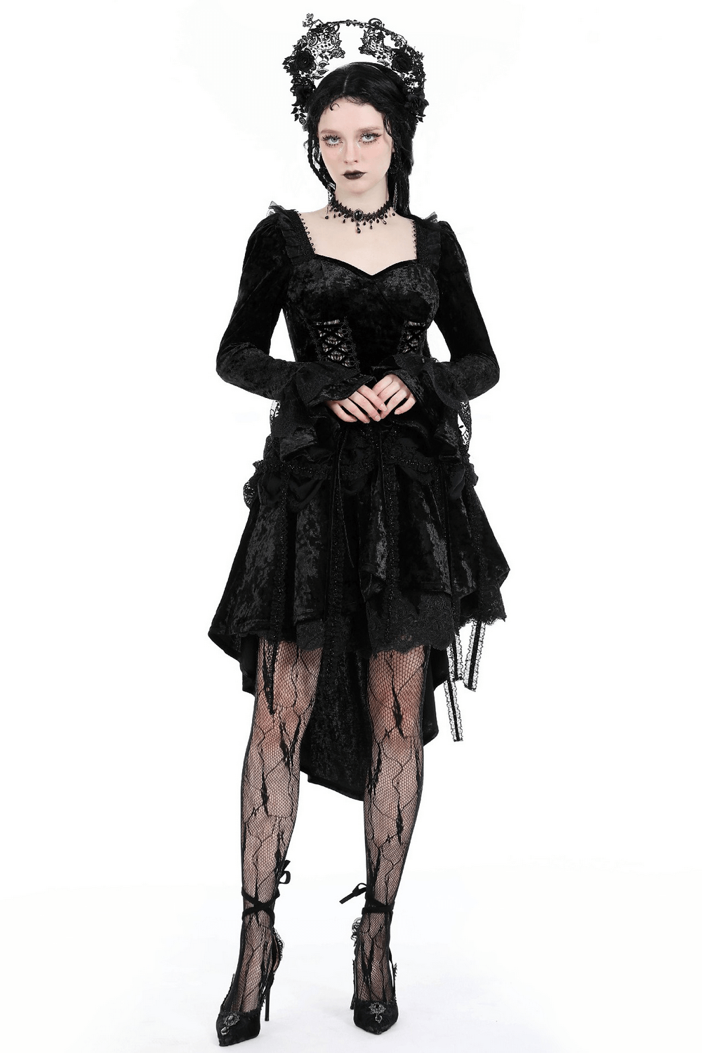 Elegant Gothic black velvet dress with lace sleeves and high-low skirt, perfect for a dramatic night out.