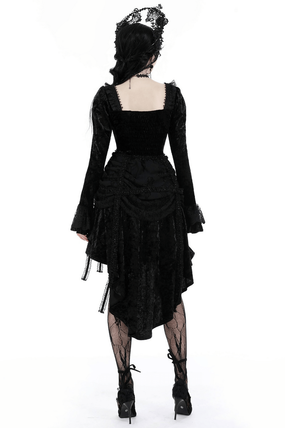 Elegant Gothic black velvet dress with long sleeves and high-low skirt, perfect for a dramatic look.