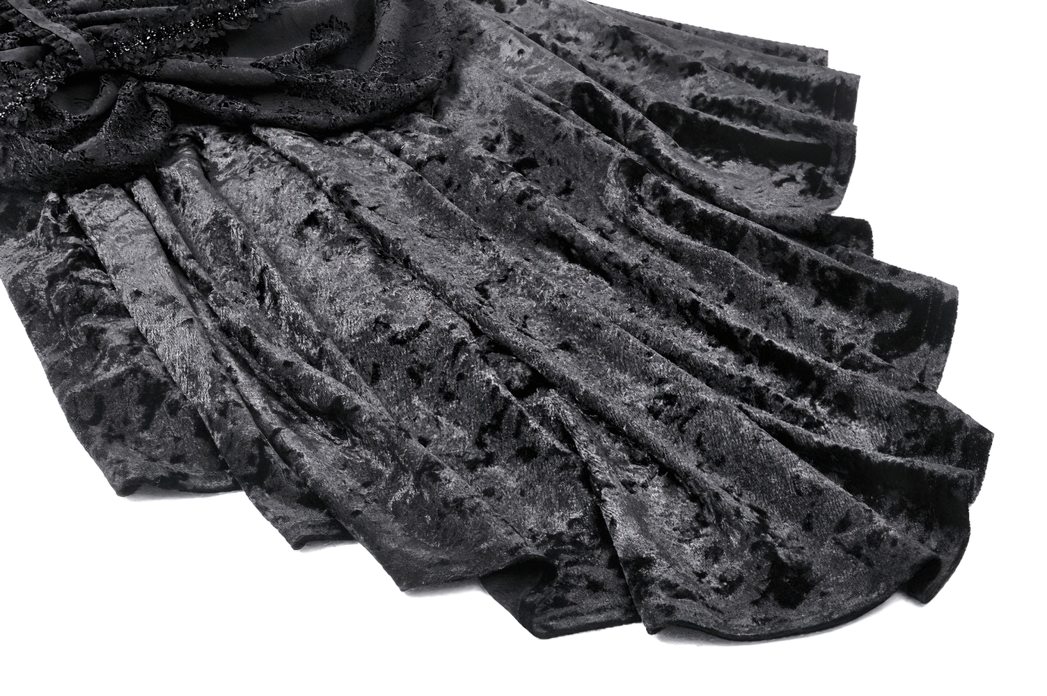Close-up of a luxurious black velvet fabric with dramatic draping, perfect for a Gothic long sleeve dress.