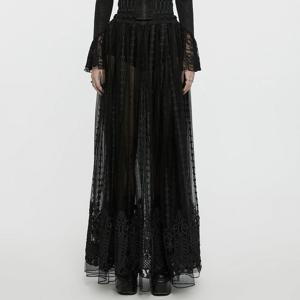 Elegant gothic maxi skirt with sheer mesh and intricate 3D floral embroidery, creating a mysterious silhouette.