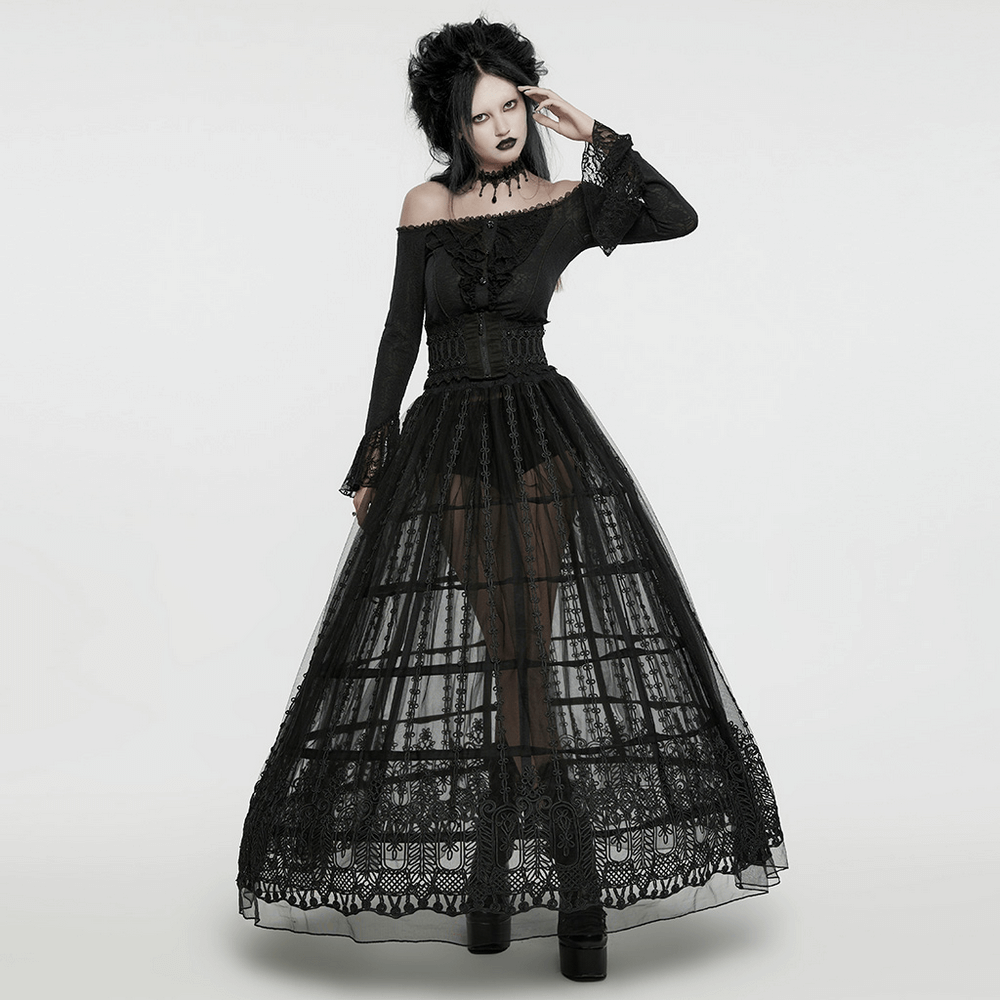 Elegant goth model in black sheer maxi skirt with 3D floral embroidery, exuding mystery and ethereal charm.