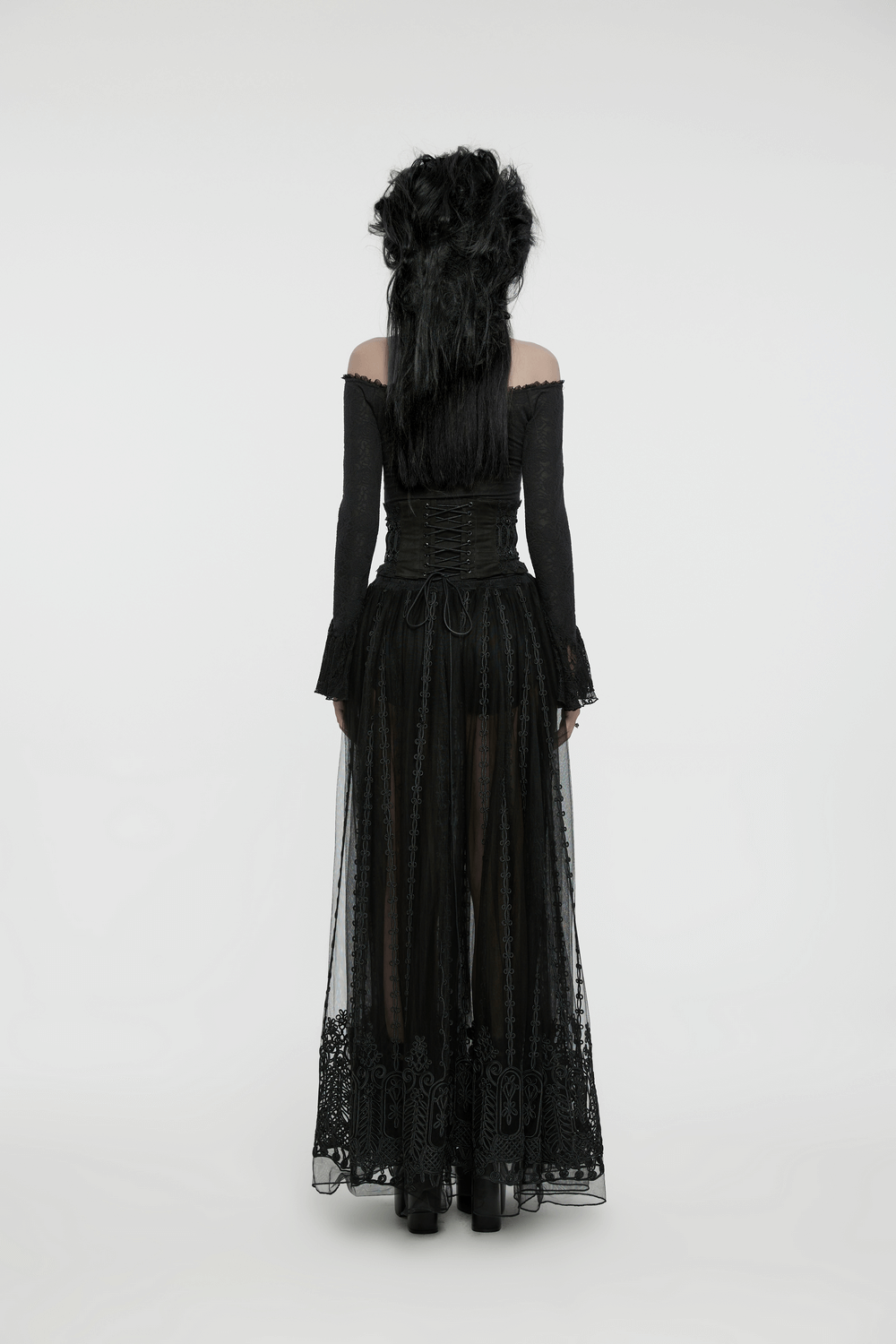 Elegant black gothic maxi skirt with sheer mesh and intricate embroidery, showcasing a back view of a model.