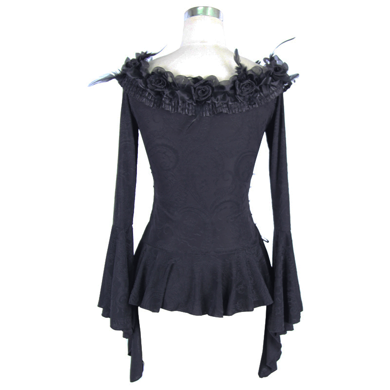 Elegant black gothic top featuring flared sleeves, lace-up detail, and floral accents with feathers.
