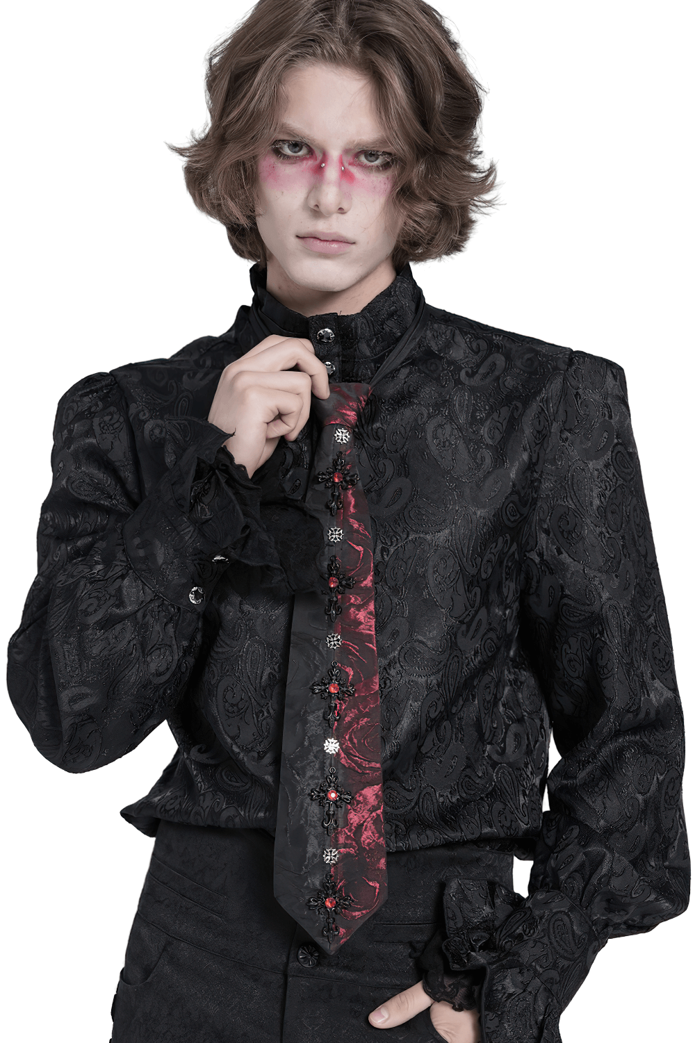 Model wearing an ornate black shirt with a Gothic red-black floral crystal necktie, showcasing alternative fashion style.