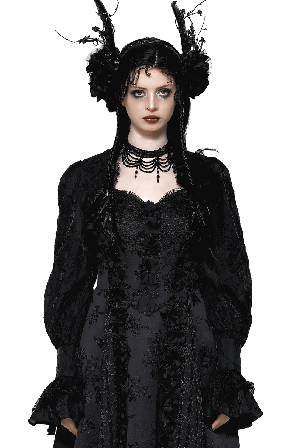 Elegant gothic woman in black bolero with lace, ruffles, and striking accessories, exuding vintage Victorian charm.