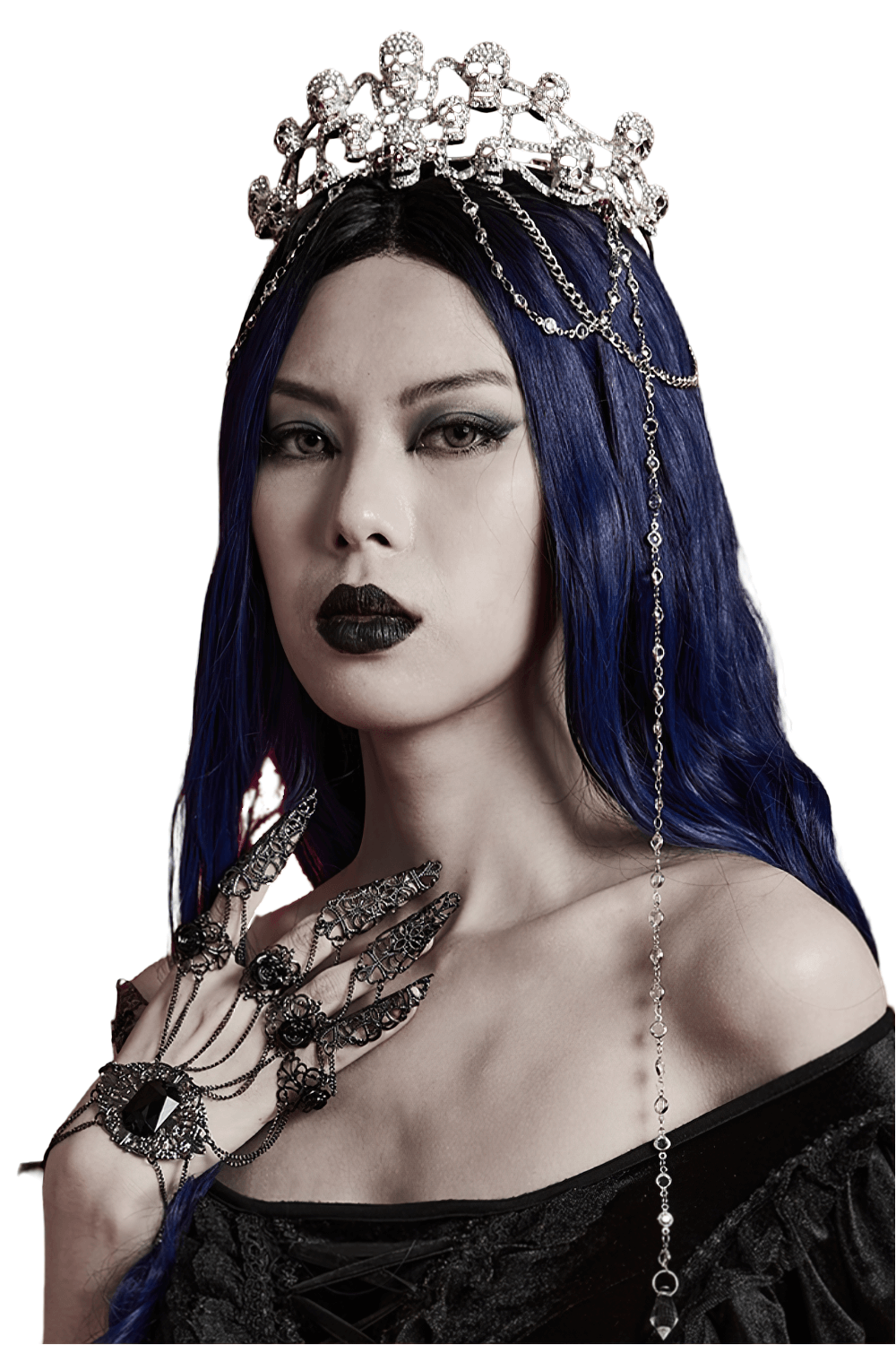 Elegant Gothic Skull Tiara with chains worn by model with blue hair and dark makeup, showcasing a regal, dark aesthetic.