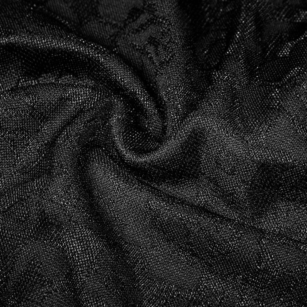 Close-up of elegant black jacquard fabric, showcasing its intricate texture and shimmering details, perfect for gothic styles.