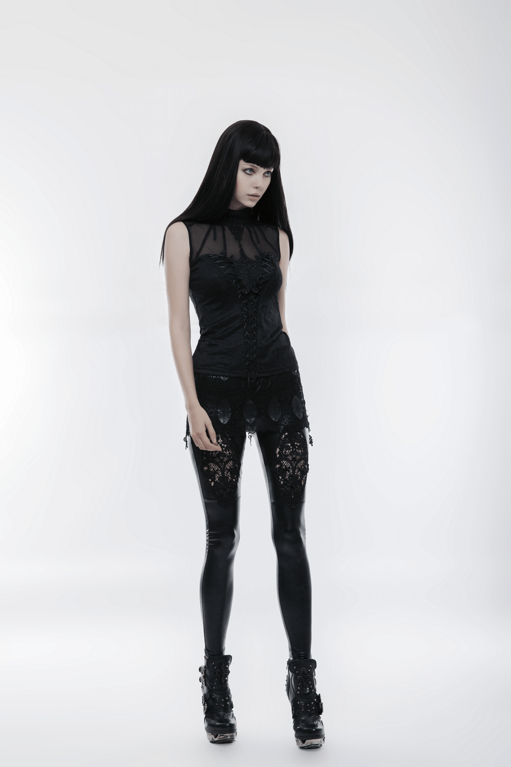 Elegant gothic black lace tank top with fringed collar, styled for a punk-inspired look.