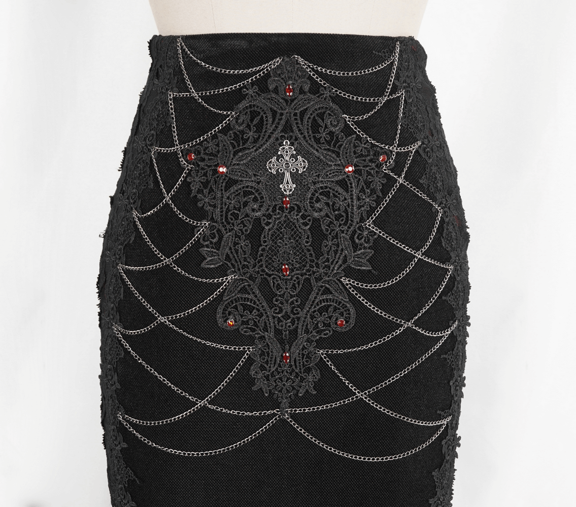Elegant black velvet mermaid skirt with intricate lace and red gem detailing, perfect for gothic fashion lovers.
