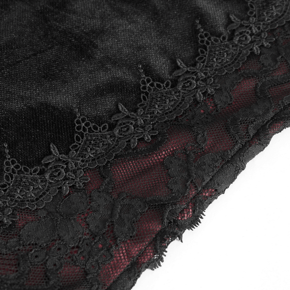 Close-up of black velvet fabric with intricate lace overlay, showcasing gothic elegance perfect for a mermaid skirt.