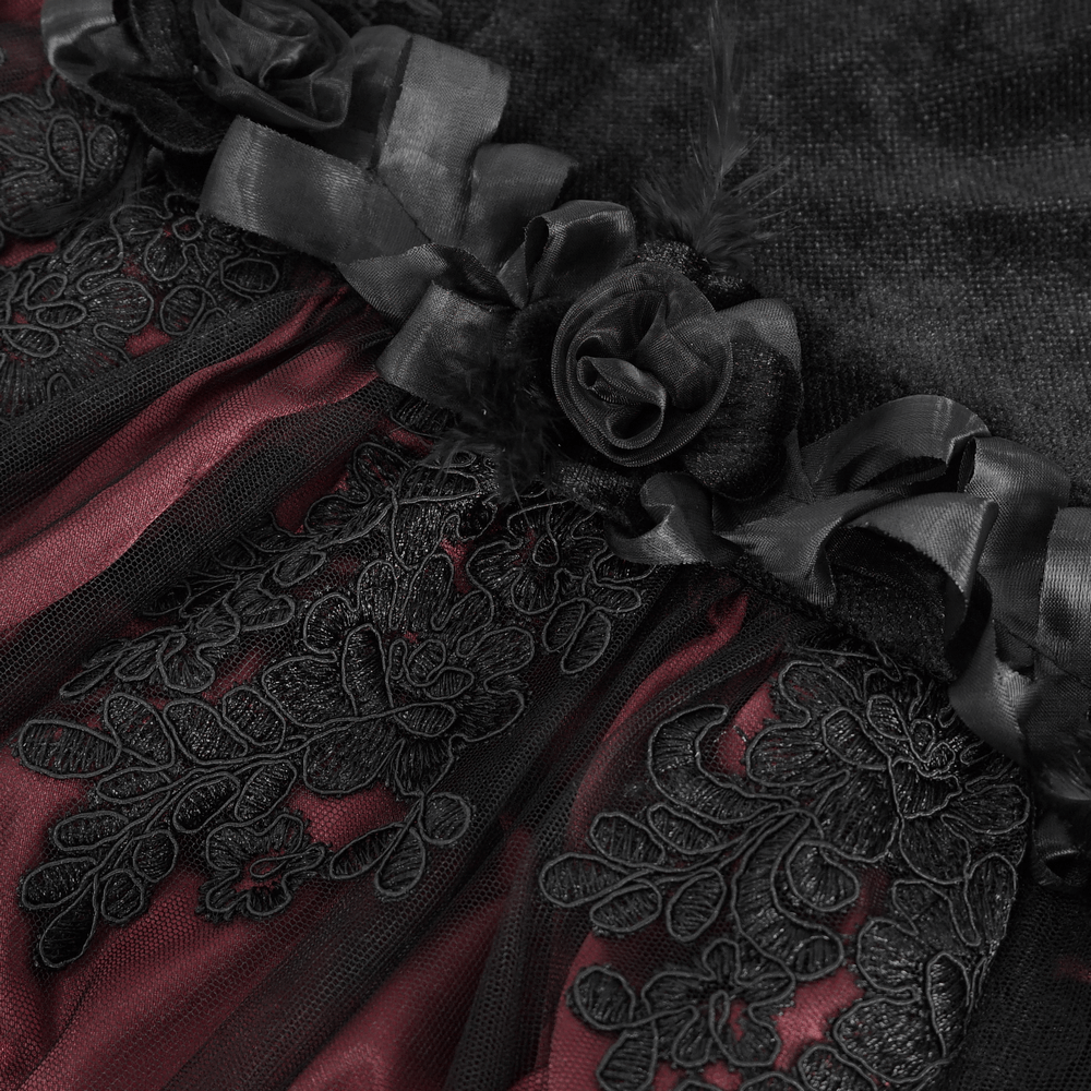 Elegant lace and rose detailing on a black velvet mermaid skirt, perfect for a gothic-inspired outfit.