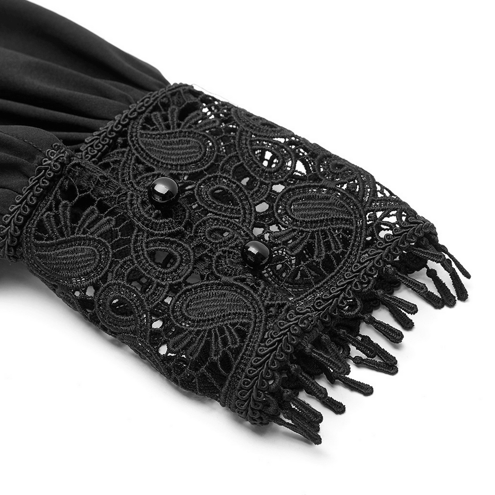 Close-up of elegant black lace cuff with buttons, detailing for gothic Victorian blouse.